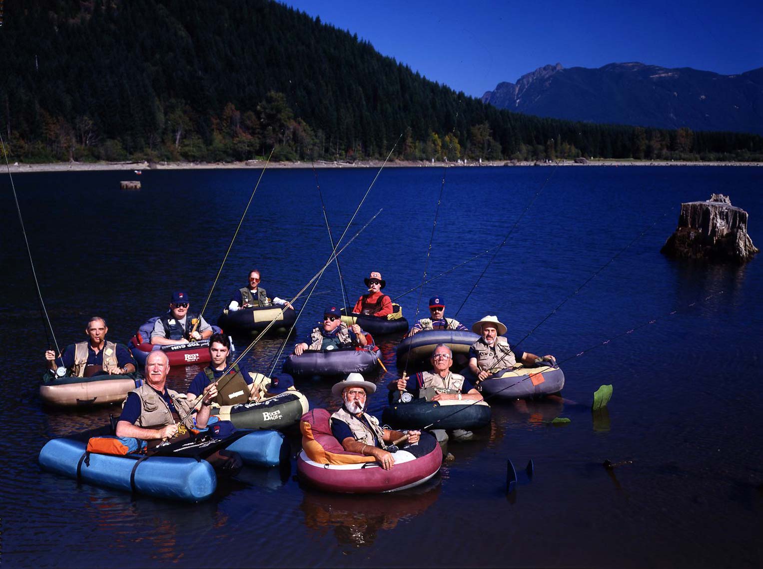 RUBBER BOAT FISHERMEN; RATTLESNAKE LAKE, WA / OUTDOOR MAGAZINE AND TV NETWORKS
